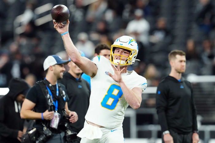 Dec 14, 2023; Paradise, Nevada, USA; Los Angeles Chargers quarterback Max Duggan (8) warms up before the game against the Las Vegas Raiders at Allegiant Stadium. Mandatory Credit: Stephen R. Sylvanie-USA TODAY Sports